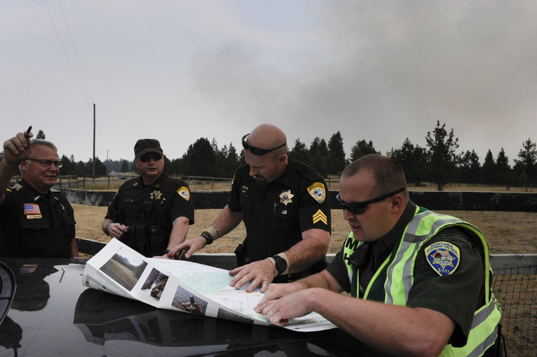 Roughly one hundred personnel and multiple aircraft help battle a lightening caused fire south of Helena Thursday afternoon.